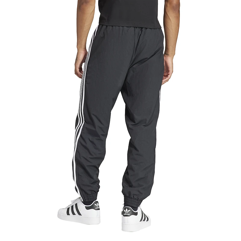 adidas Originals Pantalon d'athlétisme tissé Firebird - Pour hommes