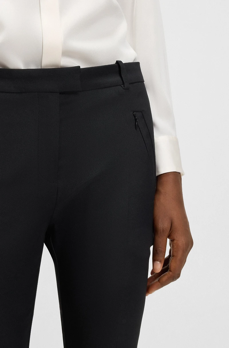 Cropped slim-fit trousers with zipped hems