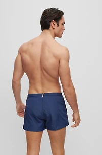 Quick-drying swim shorts with outline logo