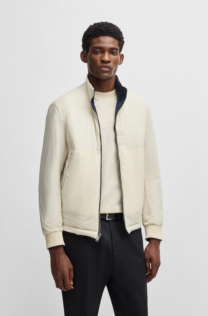 Water-repellent reversible jacket with logo badge