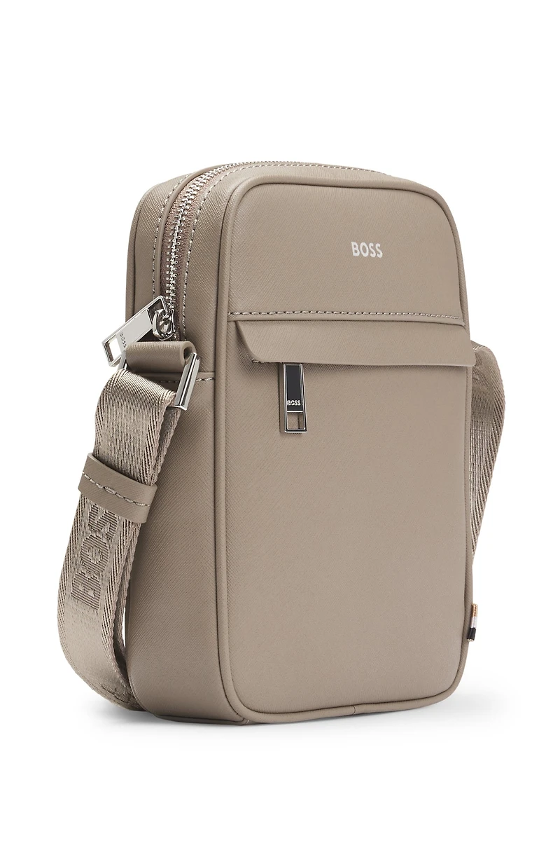 Reporter bag with signature stripe and logo detail