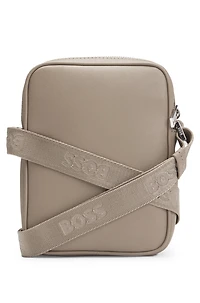 Reporter bag with signature stripe and logo detail