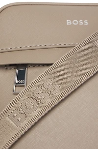 Reporter bag with signature stripe and logo detail