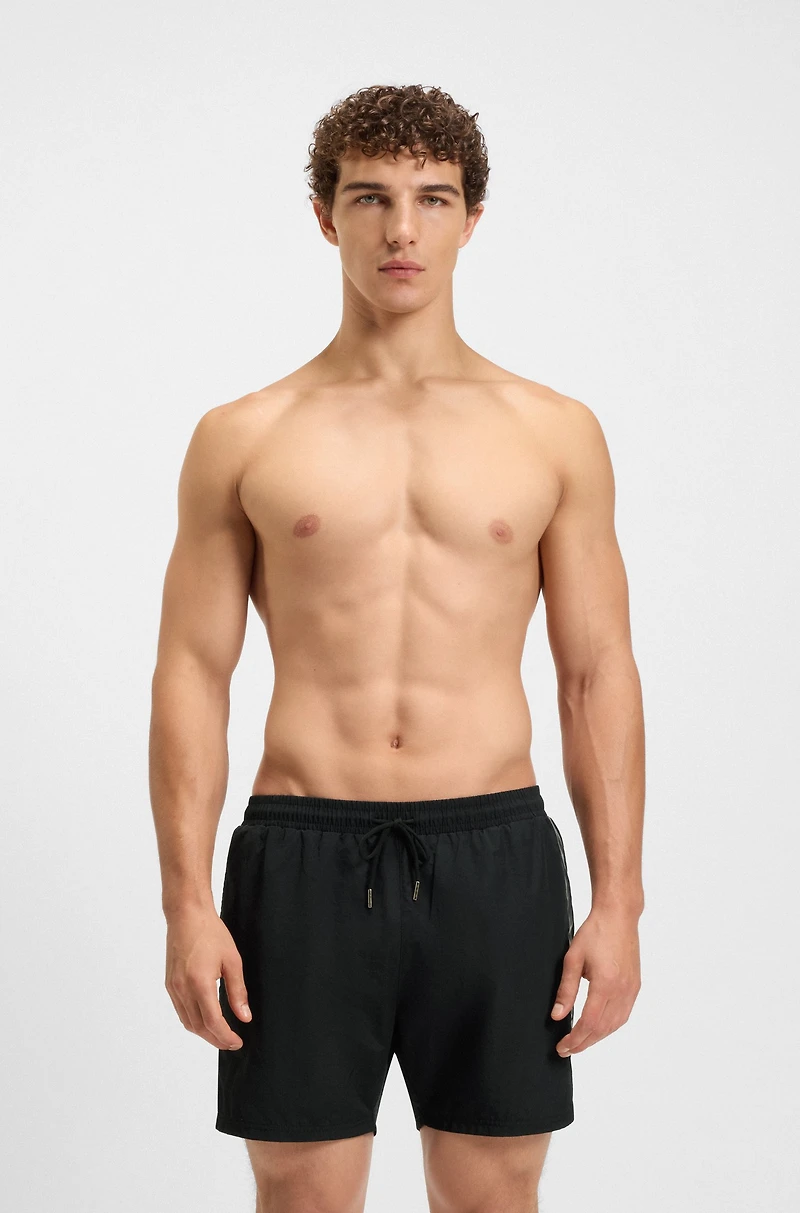 Swim shorts with foil-print logo