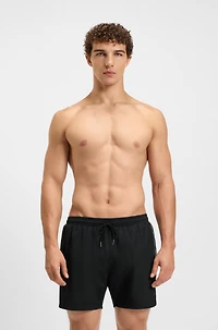 Swim shorts with foil-print logo