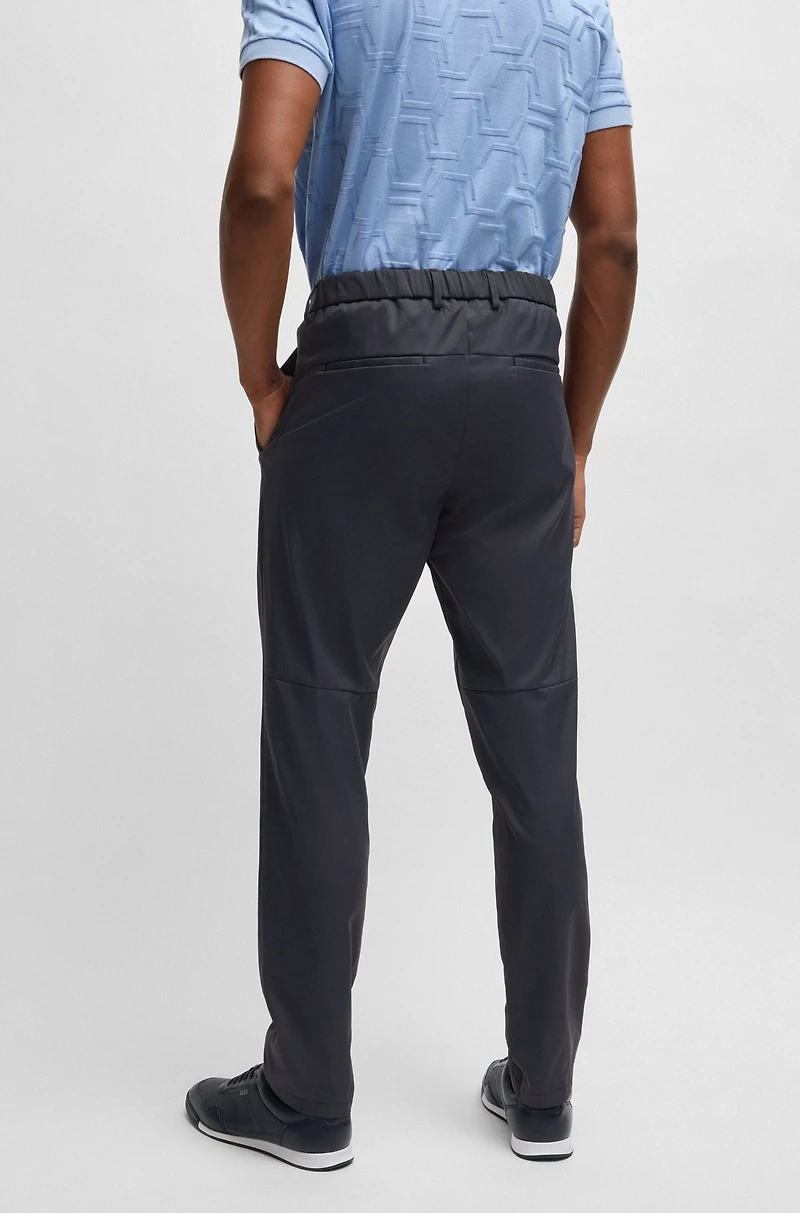 Regular-fit chinos with hidden drawcord and tapered leg