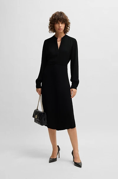 Belted dress with collarless V neckline and button cuffs