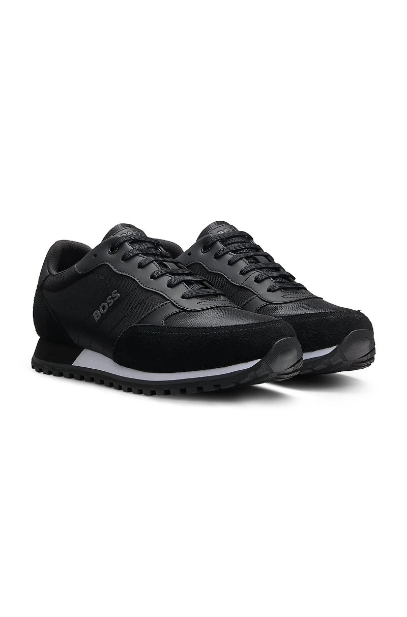 Running-inspired trainers with faux-leather trims