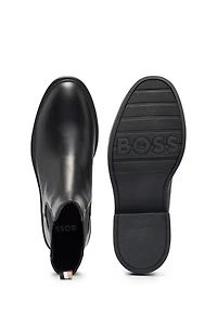 Leather Chelsea boots with branded trim and signature stripe