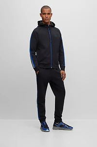 Mixed-material trainers with rubberized faux leather