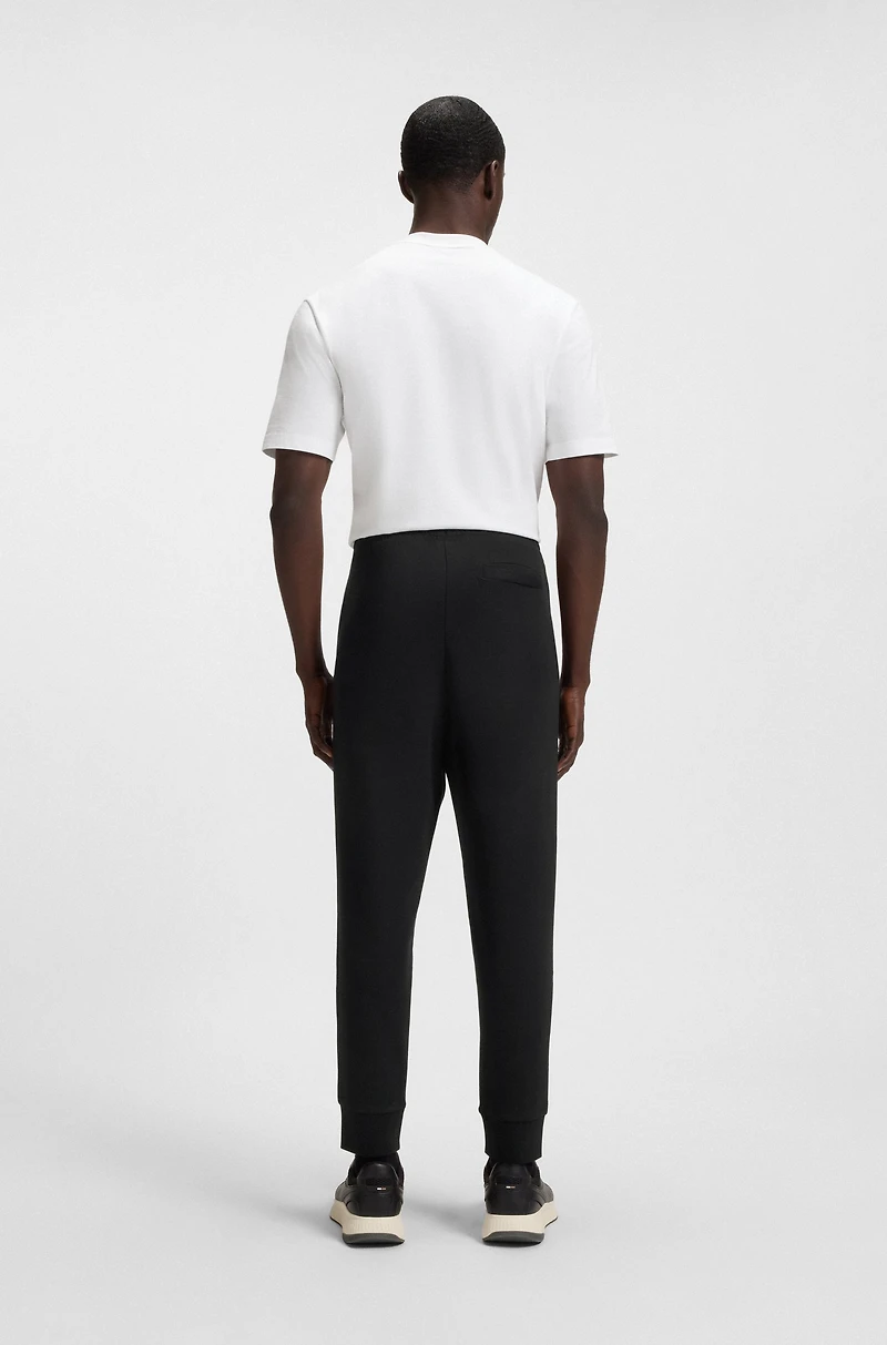 Stretch-cotton tracksuit bottoms with logo print