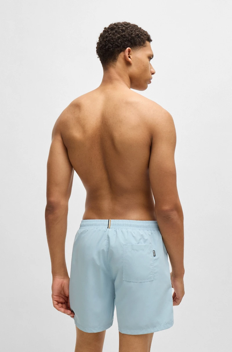 Fully lined swim shorts with logo print