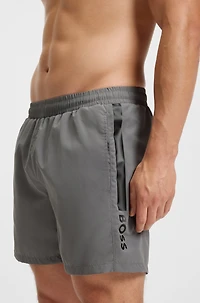 Swim shorts with logo and stripe