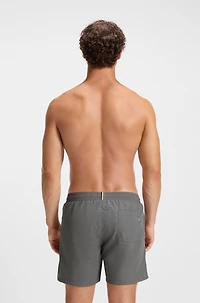 Swim shorts with logo and stripe