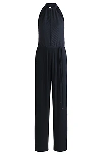Sleeveless jumpsuit with plissé pleats and tie belt