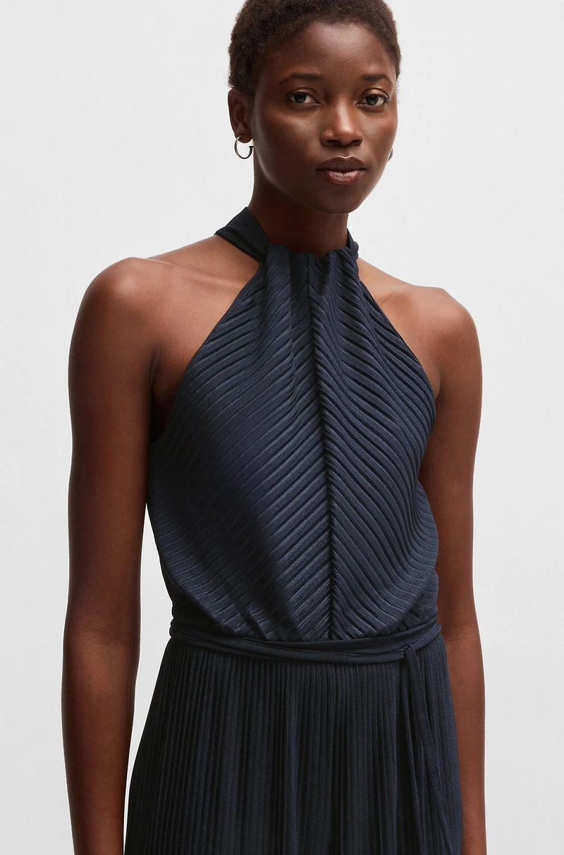 Sleeveless jumpsuit with plissé pleats and tie belt