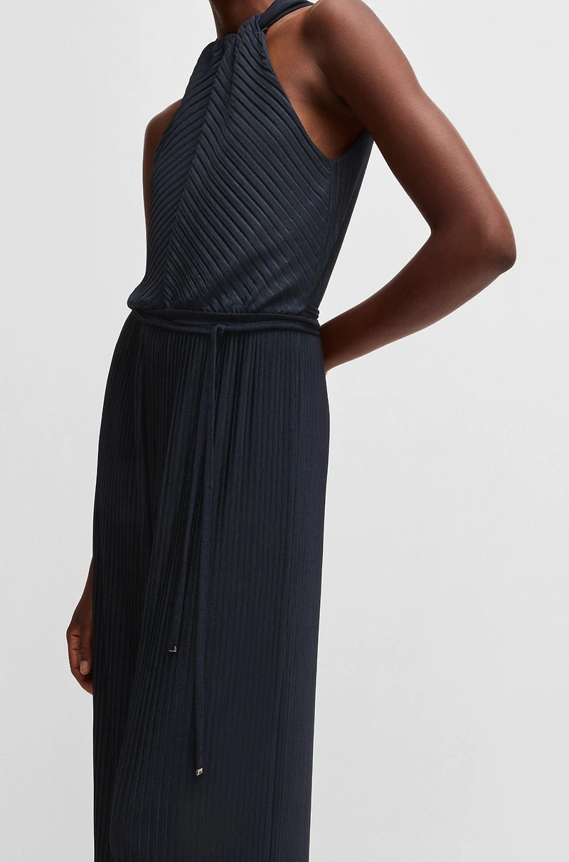 Sleeveless jumpsuit with plissé pleats and tie belt