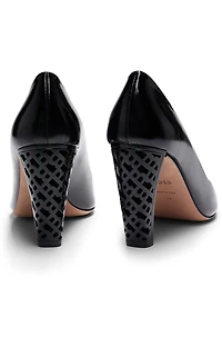 Leather pumps with monogram-patterned heels