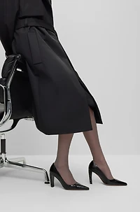 Leather pumps with monogram-patterned heels