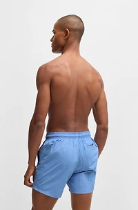 Fully lined swim shorts with logo print