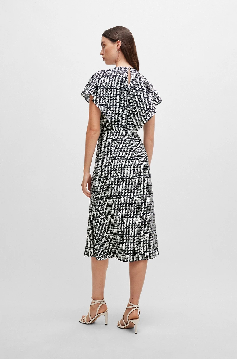 Short-sleeved dress abstract-patterned fabric