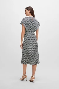 Short-sleeved dress abstract-patterned fabric