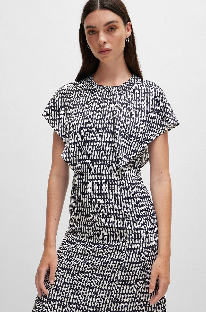 Short-sleeved dress abstract-patterned fabric