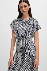 Short-sleeved dress abstract-patterned fabric