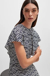 Short-sleeved dress abstract-patterned fabric