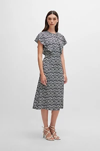 Short-sleeved dress abstract-patterned fabric