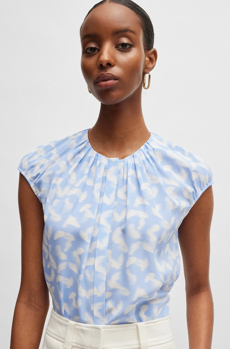 Collarless cap-sleeve blouse printed silk