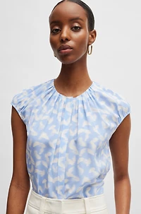Collarless cap-sleeve blouse printed silk