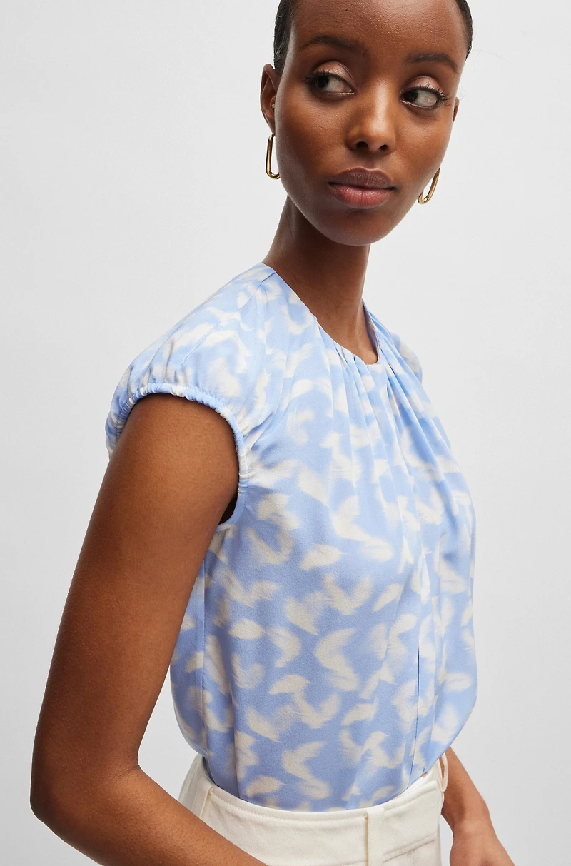 Collarless cap-sleeve blouse printed silk