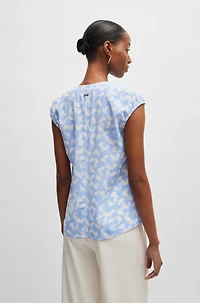 Collarless cap-sleeve blouse printed silk