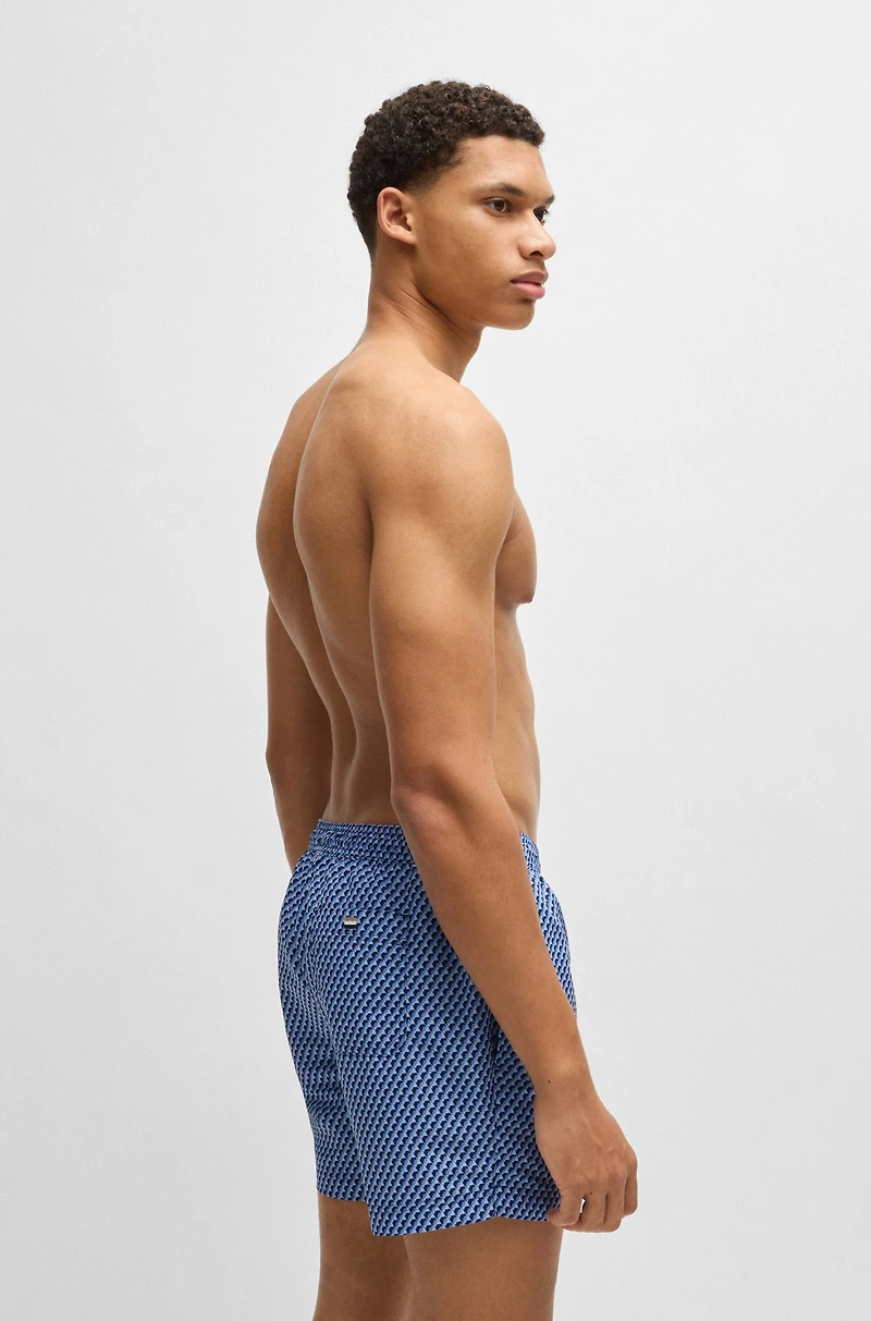Drawstring-waist swim shorts with all-over print