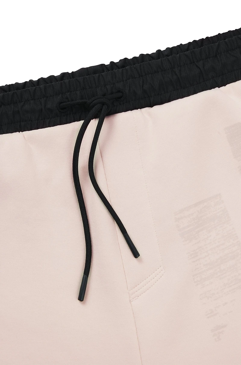 Tracksuit bottoms with seasonal artwork