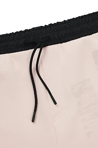 Tracksuit bottoms with seasonal artwork