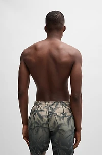 Quick-dry swim shorts with seasonal print