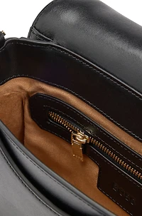 Italian-leather saddle bag with signature hardware