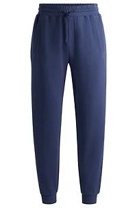 Cotton-terry tracksuit bottoms with flocked logo