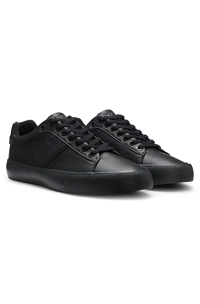 Faux-leather trainers with plain and grained textures