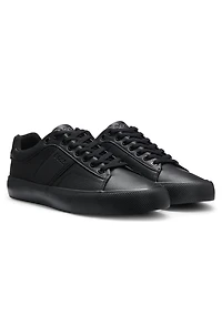 Faux-leather trainers with plain and grained textures