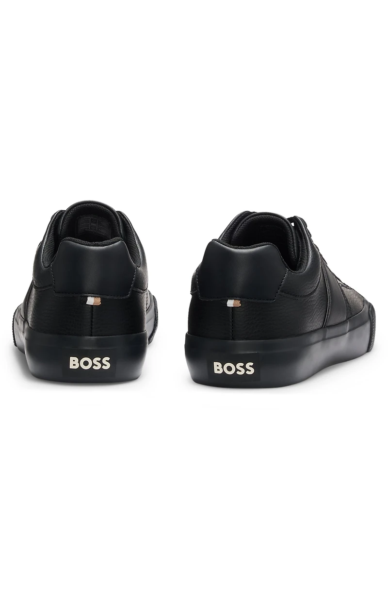 Faux-leather trainers with plain and grained textures