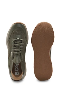 Mixed-material trainers with fishbone sole and signature accents