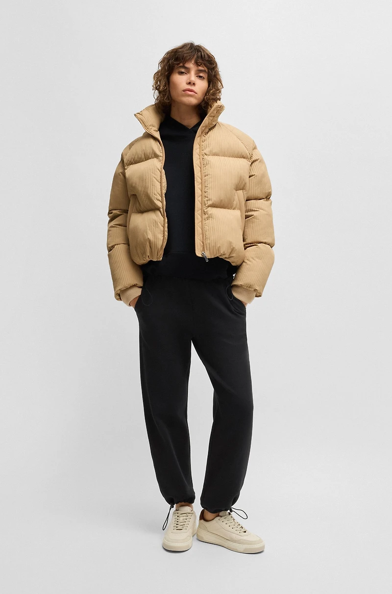 Tracksuit bottoms with adjustable hems