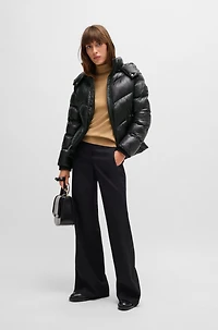 Water-repellent padded jacket with adjustable hood