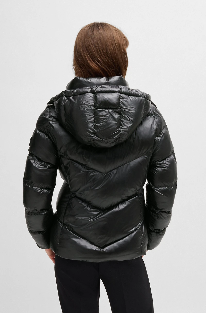 Water-repellent padded jacket with adjustable hood