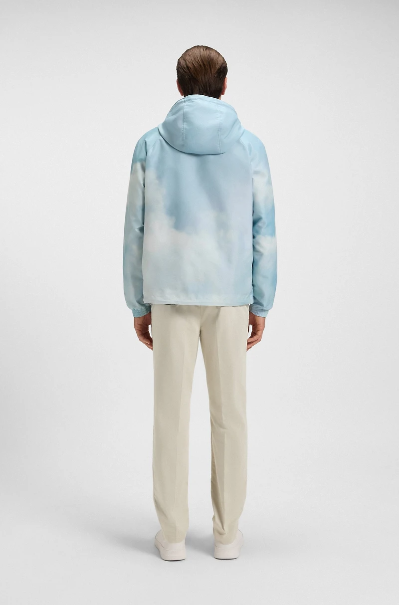 Water-repellent jacket with cloud artwork