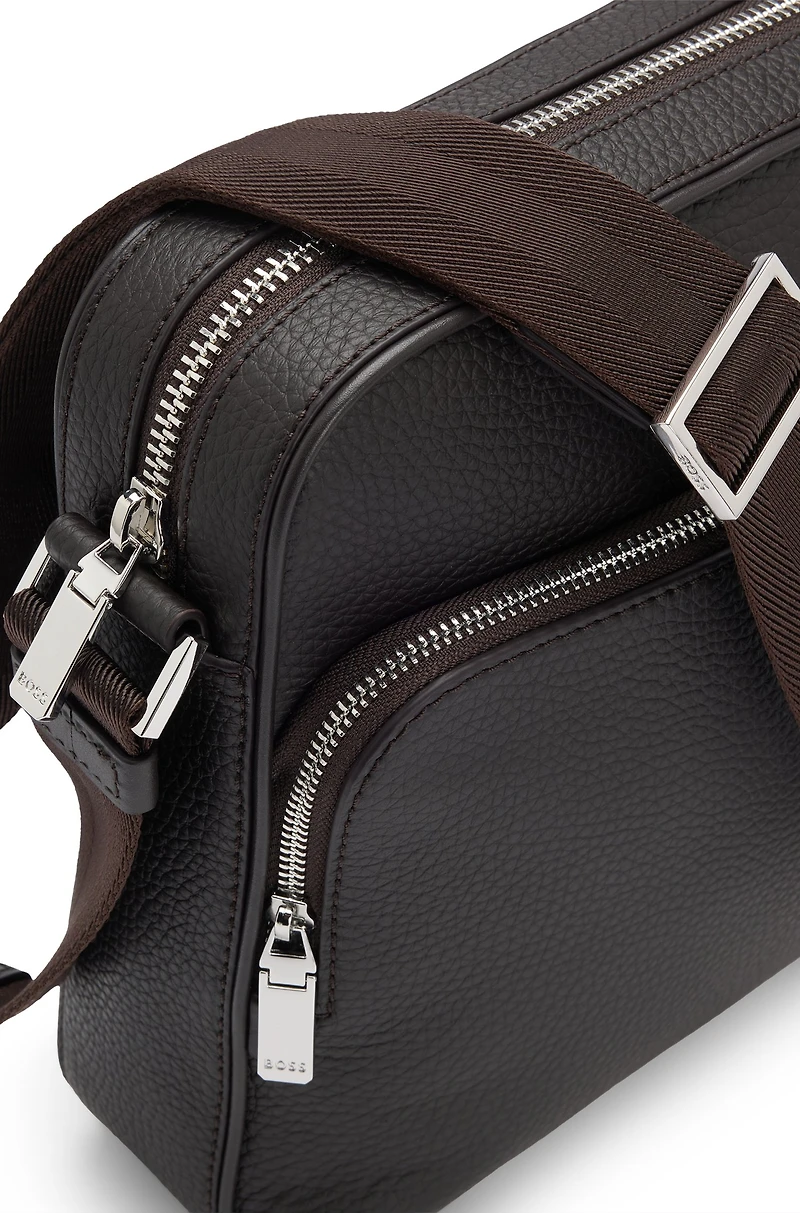 Reporter bag in grained Italian leather with embossed logo