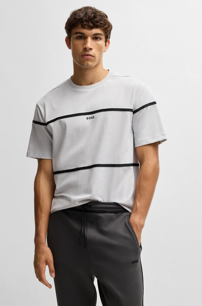 Tracksuit bottoms with tape and logo